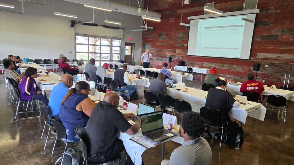 Participants of the train-the-trainer workshop receive instruction at the Agricenter Showplace Arena in Cordova, Tennessee.